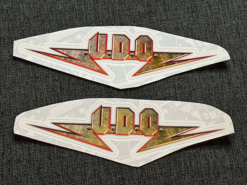 Lot (2) U.D.O. 1 1/4″ x 5″ Band Logo STICKERS Gold Red FAST! FREE SHIP! UDO