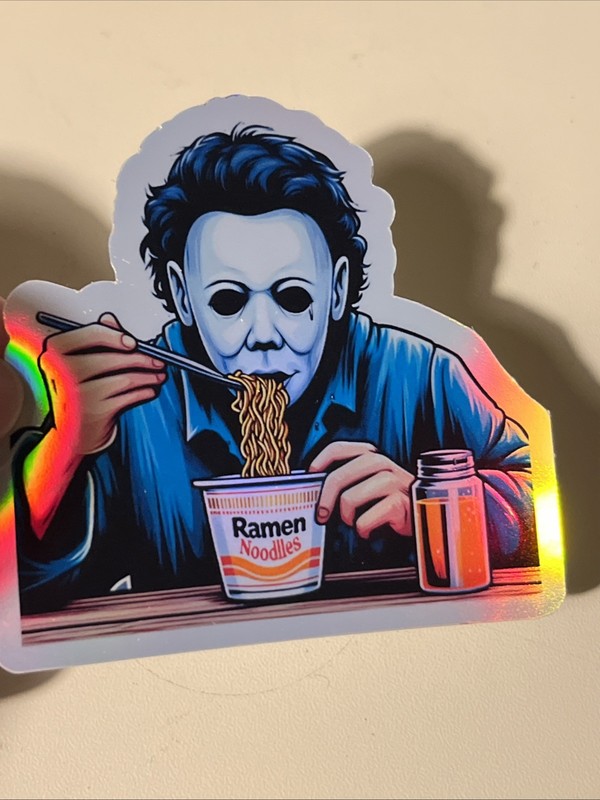 Michael Myers Eating Ramen noodle 3 Inch Holographic Sticker gallery